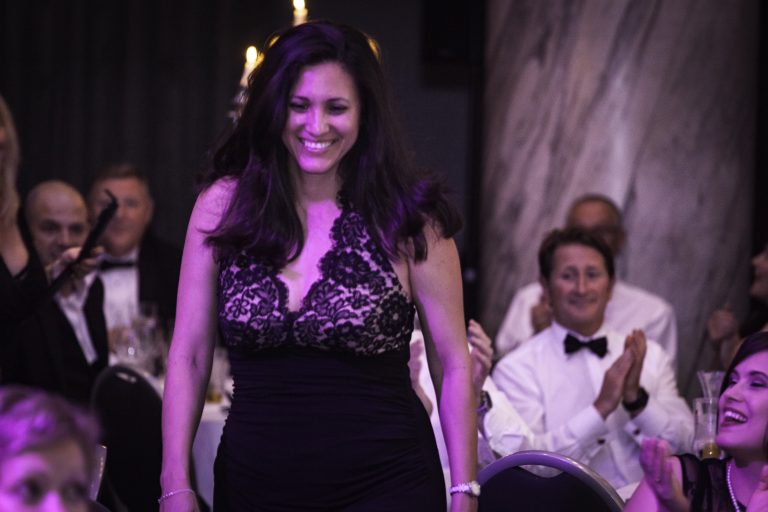 woman recieving an award